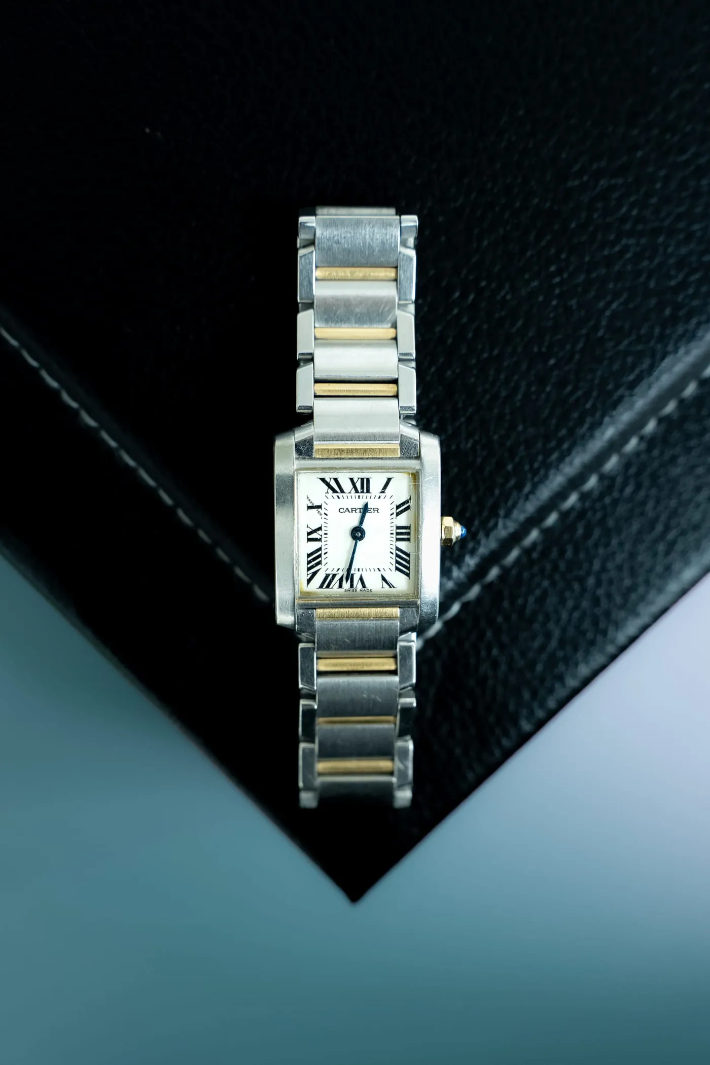 Two-tone Cartier Tank Française on its steel and gold bracelet