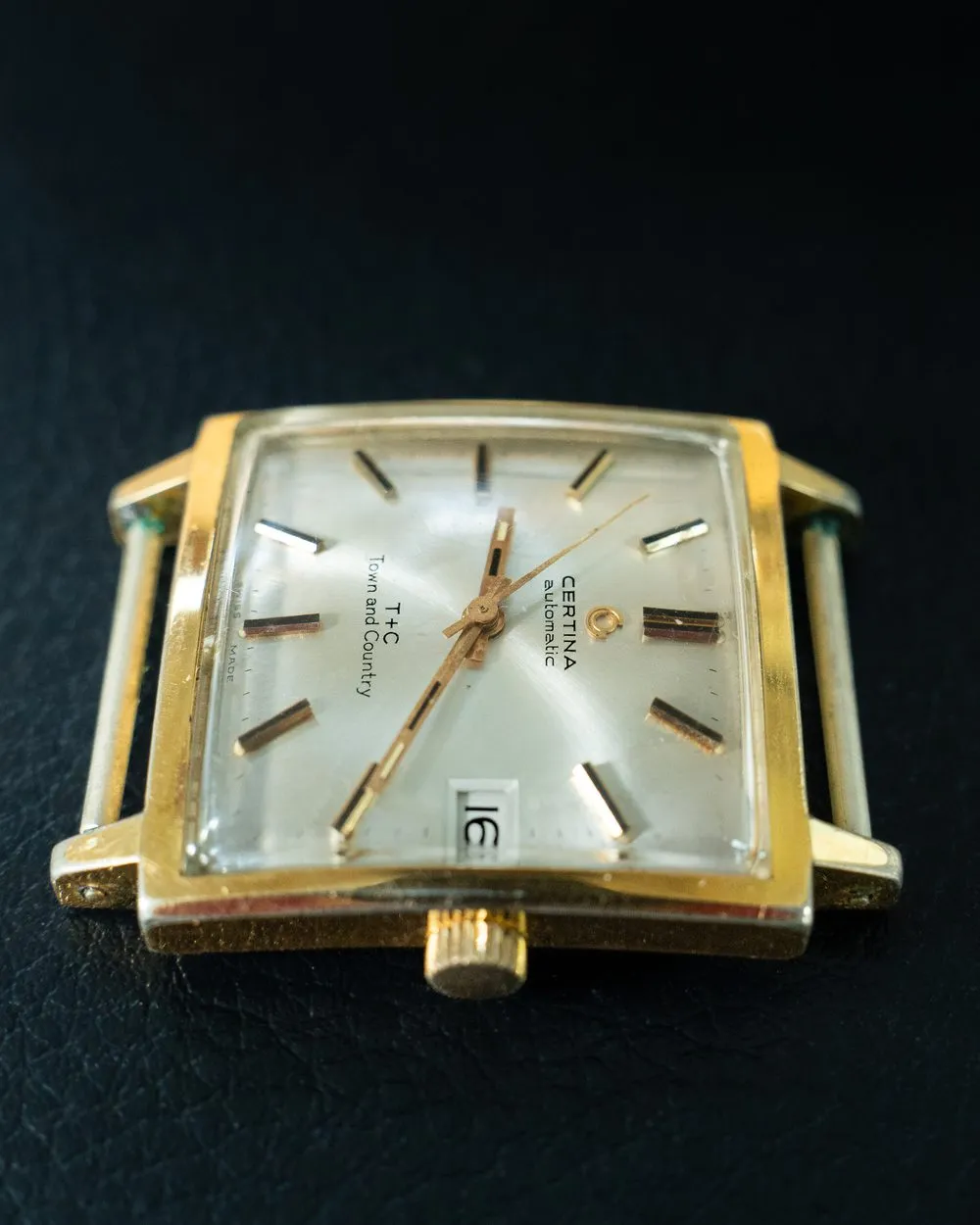 Vintage gold-plated square Certina with a champagne dial, awaiting restoration at SwissMade