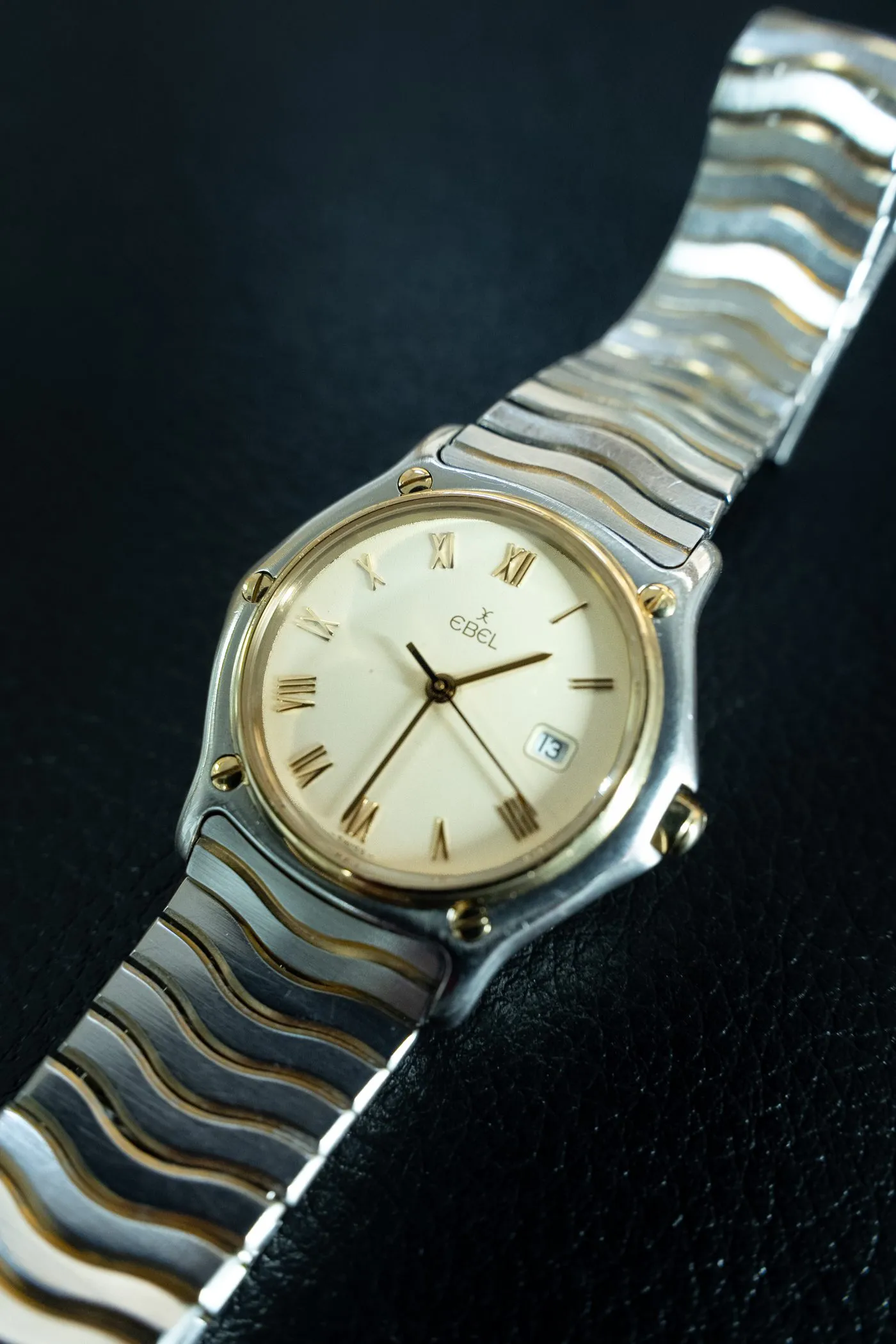 Two-tone Ebel Classic Wave on its wave bracelet at SwissMade