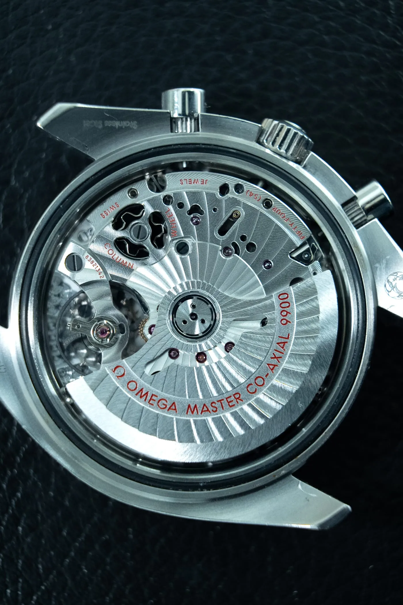 Omega Master Co-Axial 9900 movement through a Speedmaster caseback