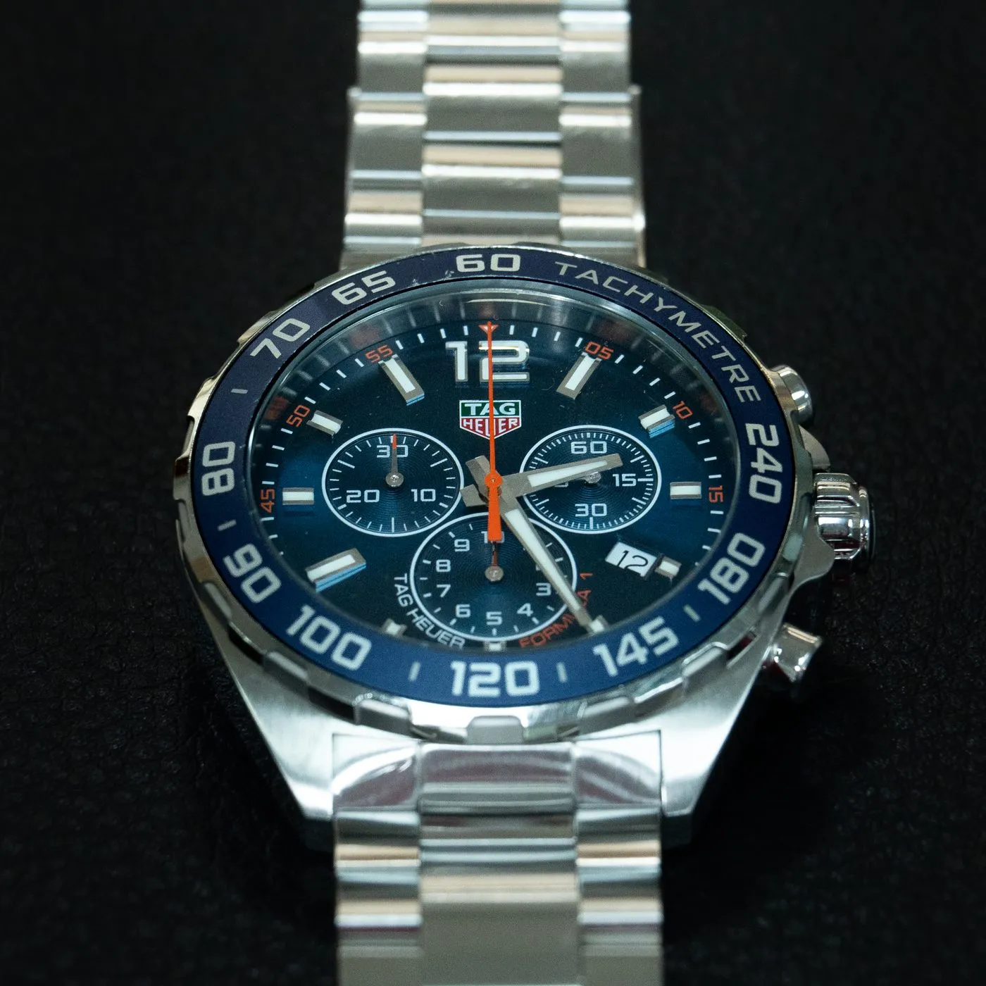 TAG Heuer Formula 1 chronograph on its steel bracelet after refinishing at SwissMade